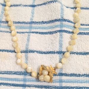 Elegant Gold and Cream Beaded Necklace